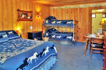 Mimbres Room with queen bed and bunk beds